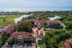 an aerial view of a resort with a river at The Buenaventura Golf & Beach Resort, Autograph Collection in Río Hato