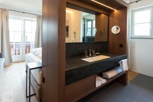 Kopalnica v nastanitvi Boutique Hotel Aichinger