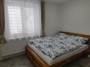Posteľ alebo postele v izbe v ubytovaní Ubytování v Žimrovicích
