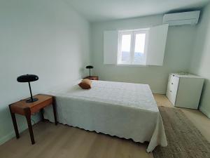 Posteľ alebo postele v izbe v ubytovaní Casa do Crasto