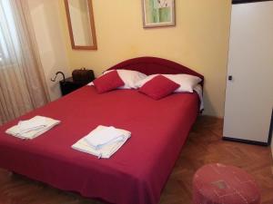 Postel nebo postele na pokoji v ubytování Dubrovnik Residence Nodilo