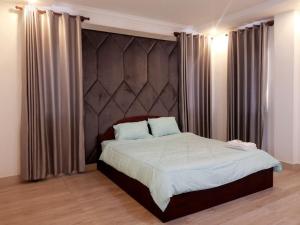 Ένα ή περισσότερα κρεβάτια σε δωμάτιο στο Murrayrata