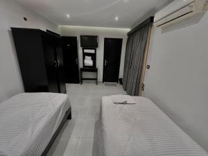 Voodi või voodid majutusasutuse Helio Cairo Hotel toas