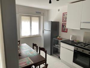 Kuchyň nebo kuchyňský kout v ubytování Giardino Sud - a pochi passi dal mare