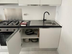 Kuchyň nebo kuchyňský kout v ubytování Giardino Sud - a pochi passi dal mare + 25 fotografií