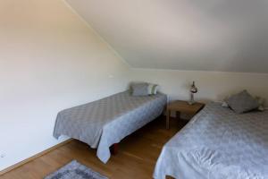 Postel nebo postele na pokoji v ubytování MD Apartment -suurepärane puhkus Kuressaares