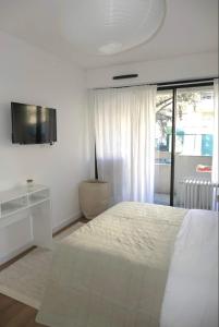 Ένα ή περισσότερα κρεβάτια σε δωμάτιο στο M007-8-9 Marquer Chambre colocation proche de la Gare