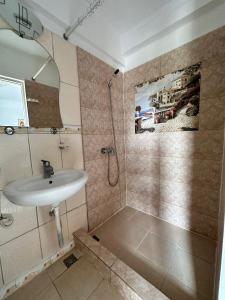 Koupelna v ubytování Casa Bucuria Henri Coanda + 15 fotografií