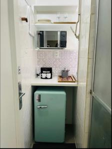 Køkken eller tekøkken på Suíte privada no melhor do Leblon