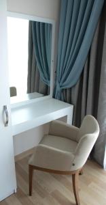 Postel nebo postele na pokoji v ubytování ParionHouse Hotel