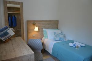 Postel nebo postele na pokoji v ubytování Hotel Citti