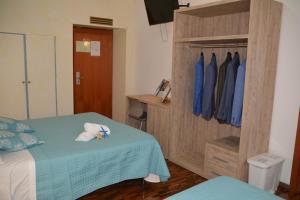 Postel nebo postele na pokoji v ubytování Hotel Citti