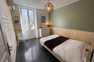 Posteľ alebo postele v izbe v ubytovaní Villa entièrement rénovée avec piscine en plein coeur de Bastia - Corse