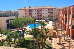 an overhead view of a courtyard with trees and buildings at Apartment Punta Umbría Luxury in Punta Umbría