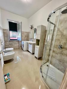 a bathroom with a shower and a sink at Casa Lollo in Chiavari