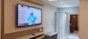 TV a/nebo společenská místnost v ubytování Hotel Pires Faxinal