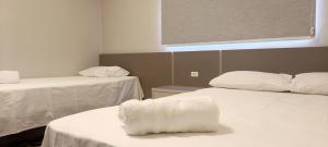 Postel nebo postele na pokoji v ubytování Hotel Pires Faxinal