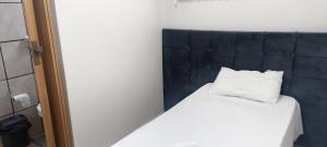 Postel nebo postele na pokoji v ubytování Hotel Pires Faxinal