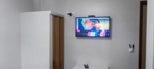 TV a/nebo společenská místnost v ubytování Hotel Pires Faxinal