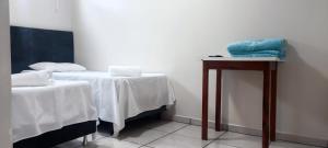 Postel nebo postele na pokoji v ubytování Hotel Pires Faxinal