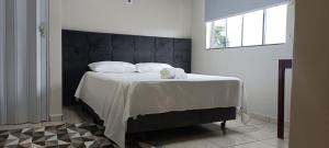 Postel nebo postele na pokoji v ubytování Hotel Pires Faxinal