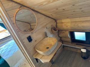an overhead view of a bathroom with a sink and a mirror at Yanis Chalet Dorna in Vatra Dornei