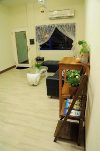 Een TV en/of entertainmentcenter bij Meet ‧ Happiness B&B
