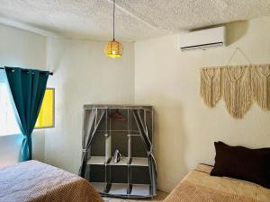 Postel nebo postele na pokoji v ubytování Casa Valentía + 37 fotografií