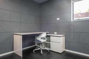 an empty office with a desk and a chair at Newly Built Two Bedroom with Double Garage in Wigram