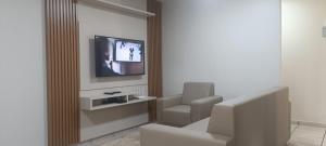 TV a/nebo společenská místnost v ubytování Hotel Pires Faxinal