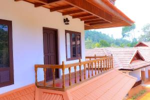 Balkón nebo terasa v ubytování Heaven Inn Munnar