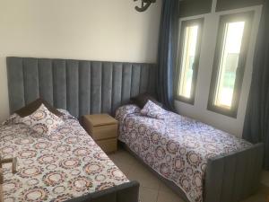 Voodi või voodid majutusasutuse Beachfront High Standard Flat toas