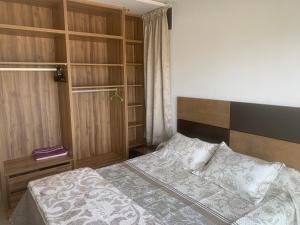 Voodi või voodid majutusasutuse Beachfront High Standard Flat toas