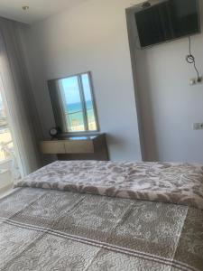 Voodi või voodid majutusasutuse Beachfront High Standard Flat toas