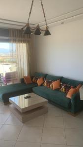 Posezení v ubytování Beachfront High Standard Flat + 15 fotografií