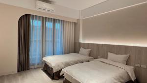 Sunny Sky Homestay客房内的一张或多张床位