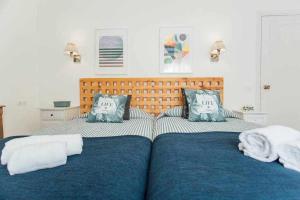 Posteľ alebo postele v izbe v ubytovaní Apartamento Boutique Abades