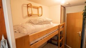 Postel nebo postele na pokoji v ubytování Chalet Club - Studio pour 2 Personnes 384