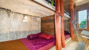 Postel nebo postele na pokoji v ubytování Peanut House