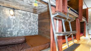 Palanda nebo palandy na pokoji v ubytování Peanut House