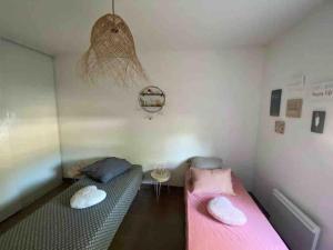Posteľ alebo postele v izbe v ubytovaní Très bel appartement contemporain et calme