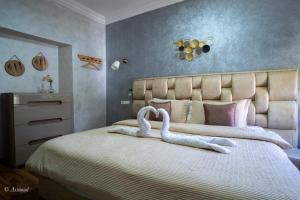 Voodi või voodid majutusasutuse Hôtel ZIRYAB toas