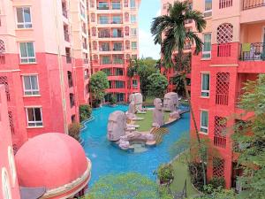 a view of a water park in a city with buildings at Seven Seas Condo Resort Jomtien Loft in Jomtien Beach