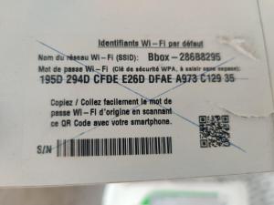 a label on a credit card on a machine at Chez Titi in Bayeux