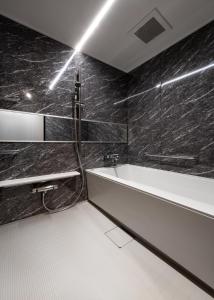 Koupelna v ubytování Hotel Legit