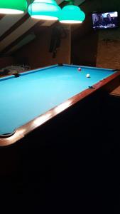 a pool table with a cue ball on it at Beko i Dada in Olib