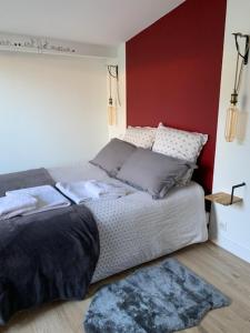 Posteľ alebo postele v izbe v ubytovaní Chambre d'Hôtes Les Petits Oiseaux