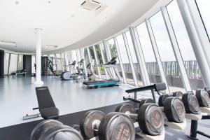 a gym with a lot of equipment in a building at iCity 2Bedroom Themepark, Mall Wi-Fi in Shah Alam