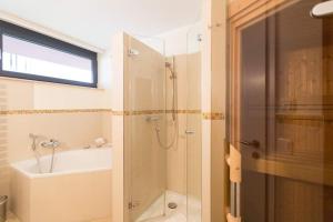 Ein Badezimmer in der Unterkunft Quartier 47, App. 07