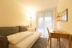 Ein Bett oder Betten in einem Zimmer der Unterkunft Quartier 47, App. 07